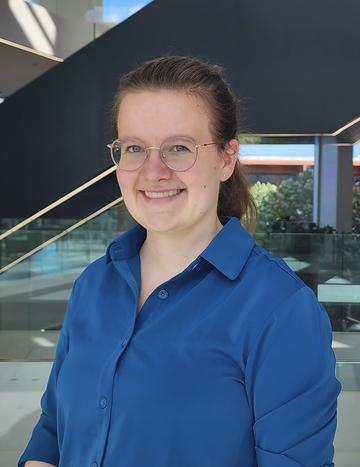 Head and shoulders of Dr Grune - she is smiling